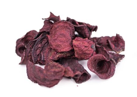 Portion of Beetroot Chips isolated on white background (selective focus)の写真素材