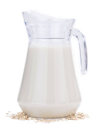 Oat Milk isolated on white background (selective focus; close-up shot)の写真素材