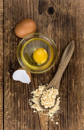 Vintage wooden table with Powdered Eggs (selective focus; close-up shot)の写真素材