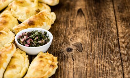 Portion of fresh homemade Empanadas as detailed close-up shot; selective focusの写真素材