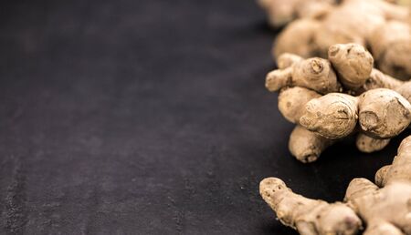 Some fresh Ginger Slices (selective focus; close-up shot)の写真素材