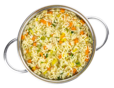 Homemade Alphabet Soup (selective focus) isolated on white backgroundの写真素材