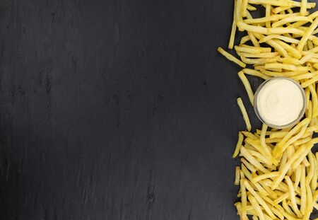 Portion of homemade French Fries (close-up shot; selective focus)