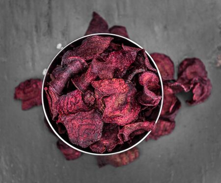 Portion of Beetroot Chips as detailed close-up shot; selective focusの写真素材