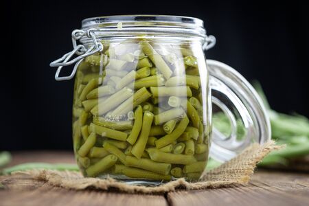 Preserved Green Beans as detailed close-up shot  (selective focus) on vintage backgroundの写真素材