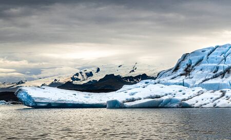 Jokulsarlon Glacier Lagoon in the eastern part of Iceland during a cloudy dayの写真素材