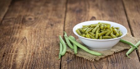Preserved Green Beans as detailed close-up shot  (selective focus) on vintage backgroundの写真素材
