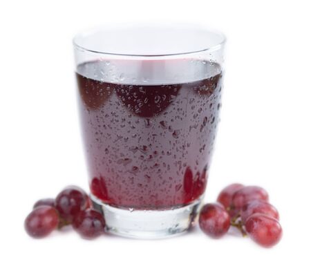 Red Grape Juice isolated on white background (selective focus; close-up shot)の写真素材