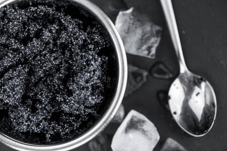 Caviar on a vintage looking slate slab (selective focus)