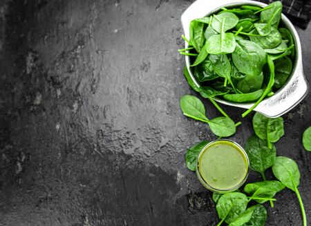 Freshly made spinach smoothie (detailed close up shot; selective focus)の写真素材