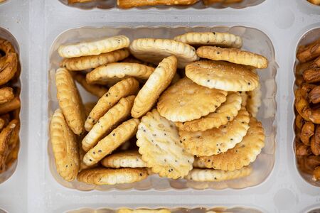 Portion of mixed Snacks (detailed close up shot; selective focus)の写真素材