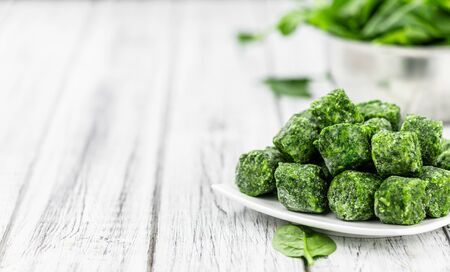 Portion of frozen spinach as detailed close up shot (selective focus)の写真素材