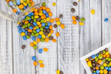 Chocolate coated peanuts as detailed close up shotの写真素材
