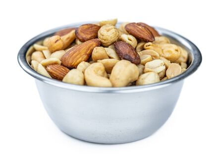 Fresh roasted nuts isolated on white background as close up shot (selective focus)の写真素材