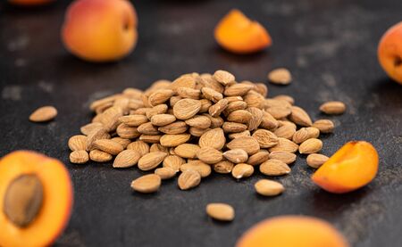 Some shelled Apricot Kernels as detailed close up shot (selective focus)の写真素材