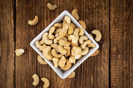 Portion of Cashew Nuts (close up shot; selective focus)の写真素材