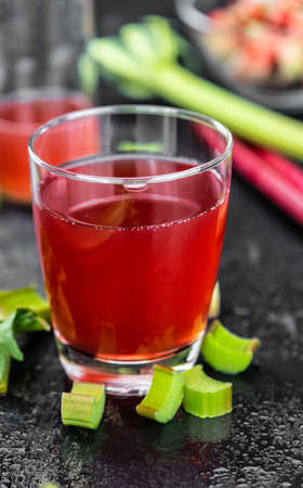 Portion of fresh made Rhubarb Spritzer (close up; selective focus)