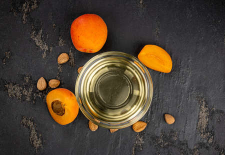 Some Apricot Kernel Oil as detailed close up shot (selective focus)の写真素材