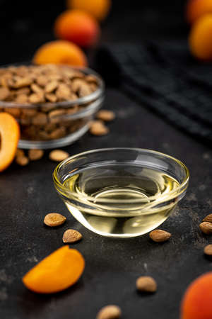Some Apricot Kernel Oil as detailed close up shot (selective focus)の写真素材