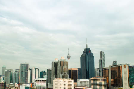 A typical Kuala Lumpur skyline during a cloudy day, with layers of buildings make up the city's...