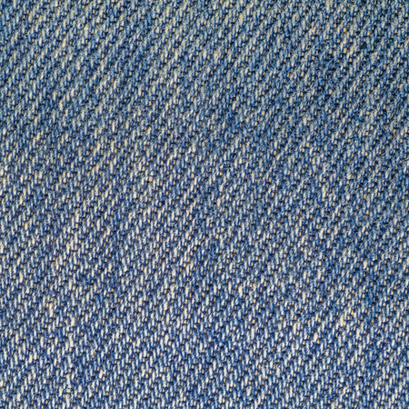 Background of jean lightness denim seamless texture close up shotの写真素材