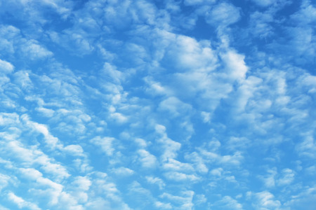 Alto-cumulus clouds in the blue sky, pattern.