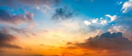 Panorama picture of blue and orange sky with cloud beautiful nature backgroundの写真素材