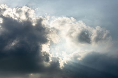 cloudy sky and silver lining sun light  backgroundの写真素材