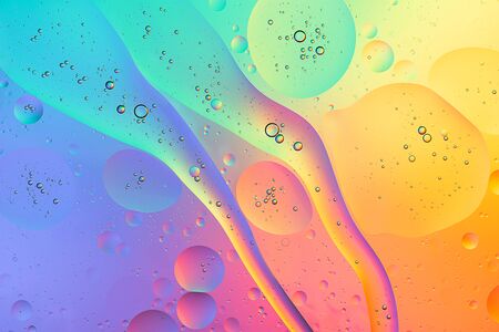 abstract macro background of oil floating on water colorful rainbow imageの写真素材