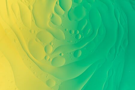 Macro image of oil and water abstract background green colorの写真素材