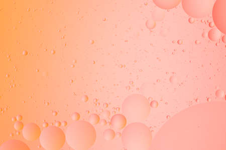 abstract macro background of oil on water image orange and pink color gradient wallpaperの写真素材