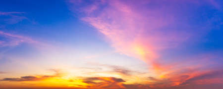 Colorful cloudy twilight sky panorama sunrise or sunset time nature backgroundの写真素材