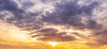 Gorgeous sunrise and twilight sky with clouds, panoramic background image.の写真素材