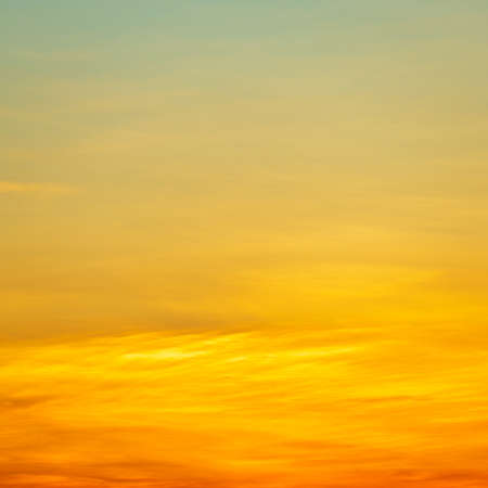 Abstract golden sky and clouds background for social mediaの写真素材