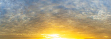 The sunrise in the morning with many clouds in the sky, panoramic view cloudscape background image.の写真素材