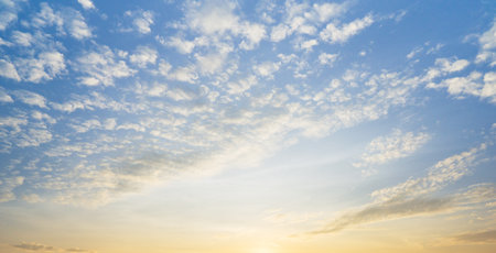 the bright blue sky and fluffy white altocumulus clouds, nature cloudy sky panorama background.の写真素材