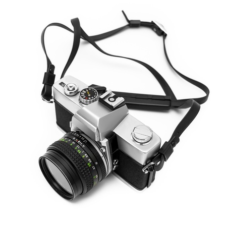 Vintage retro 35mm metal camera SLR on isolated white background.の写真素材