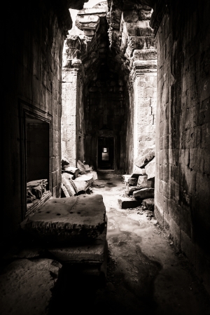 Light coming through the opening in the roof of the Cambodia ruin of Angkor Wat, Ta Prohm Temple.の写真素材