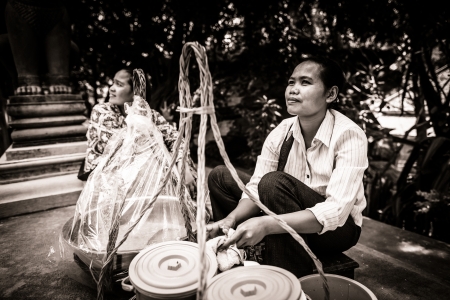 SIEM REAP, CAMBODIA - CIRCA JUNE 2012: Unidentified female stall seller of Cambodia June 2012 in SIEM REAP, CAMBODIA.のeditorial素材