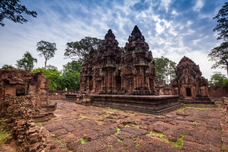 Amazing pink temple of Banteay Srei June 2012 in SIEM REAP, CAMBODIA. Banteay Srei is a decorated with elaborate carvings in much more detail than any other temple around Angkor.のeditorial素材