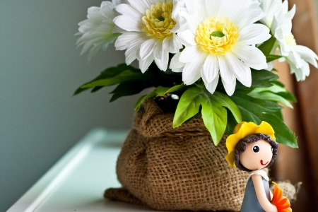 A Girl is Sitting near the windowの写真素材