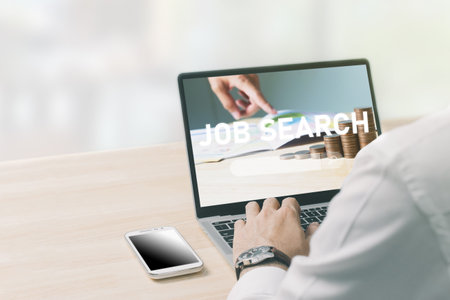 man using Internet Online Job Search application Conceptの写真素材