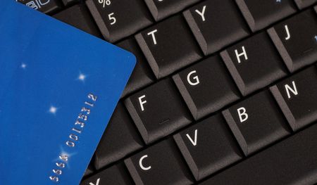 credit car on computer keyboard