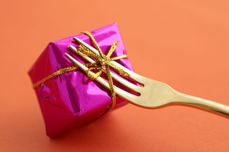 fork with a giftの写真素材
