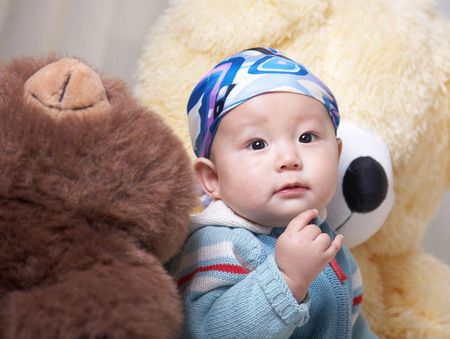 baby and teddy bearの写真素材