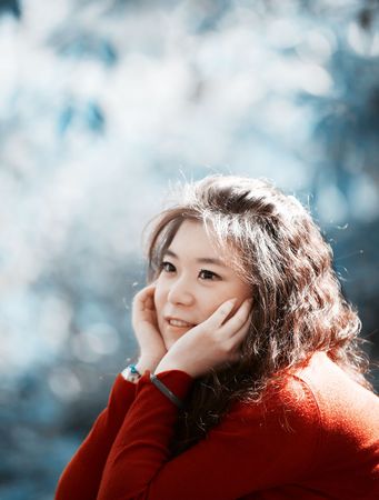 Young asian woman relaxing outdoor.の写真素材