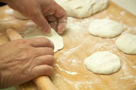 chef is preparing bread dough.