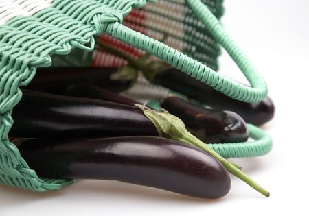 eggplant in a basketの写真素材