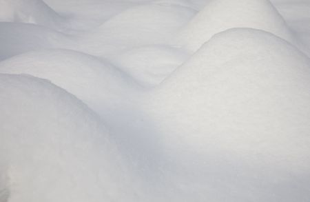 stones covered by fresh snow, just like woman's curve.
