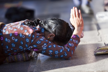  A local woman is praying at Jokhang Temple. Lhasa, Tibet, China. のeditorial素材